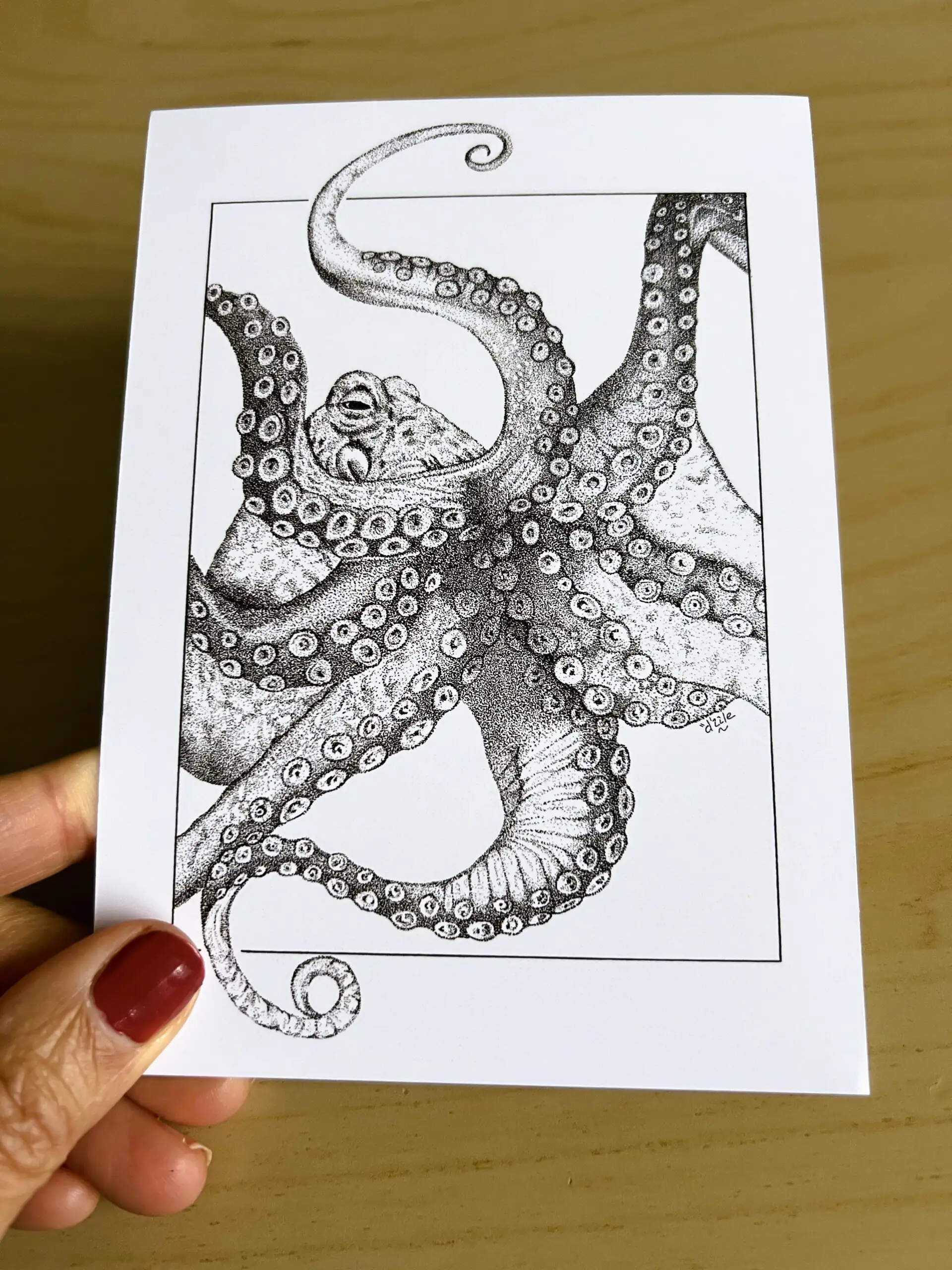 carte postale . dessin en noir et blanc d'un poulpe en pointillisme